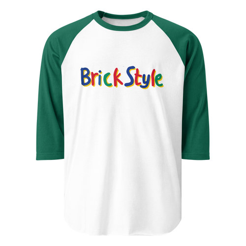 White 100% cotton shirt with green 3/4 length sleeves featuring parody AFOL slogan "Brick Style" in child-like block writing with letters alternating between blue, red, and green. Item is a BRKDrip retro collection baseball tee with a vintage building blocks aesthetic.